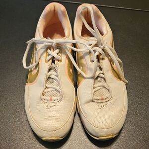 Nike White and Gold Athletic Shoes with Cushioned Midsole